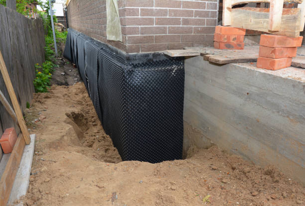 Happy homeowners after waterproofing job in Mount Calvary